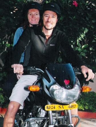 Tourist Couple On Rented Bike